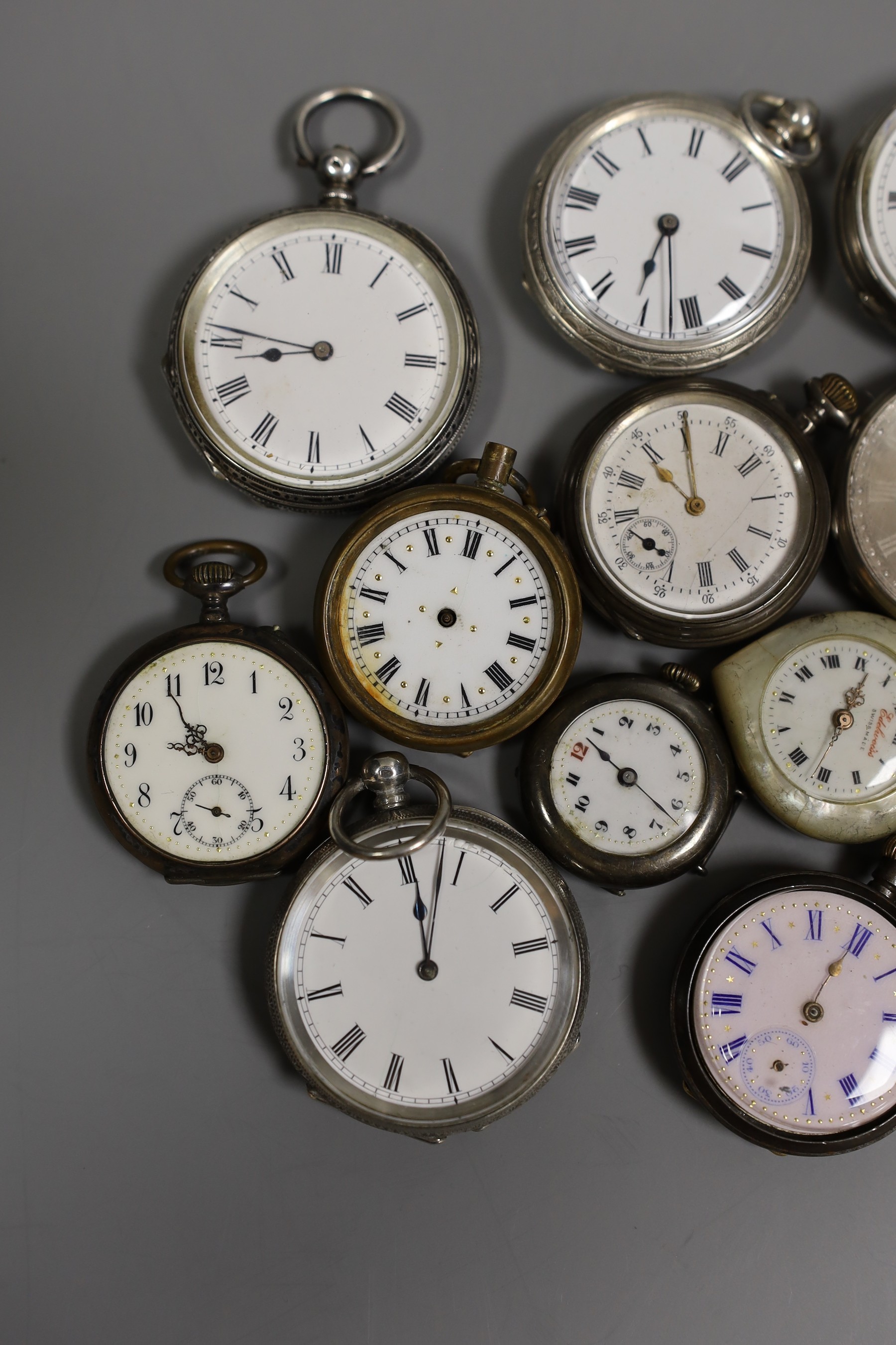 A collection of twenty five assorted mainly silver or white metal cased fob watches including Swiss, three gilt metal and one mother of pearl